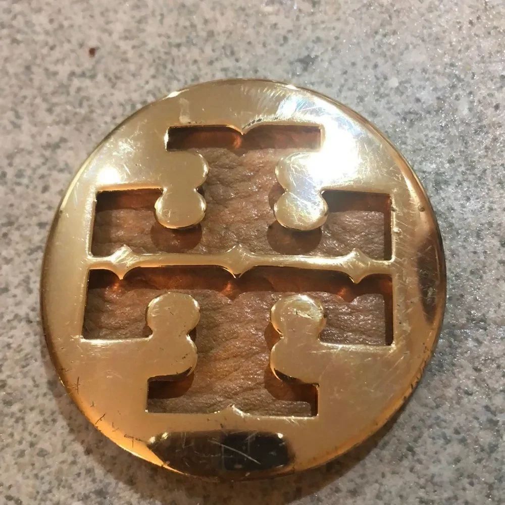Tory Burch. Large gold hardware. Reva
